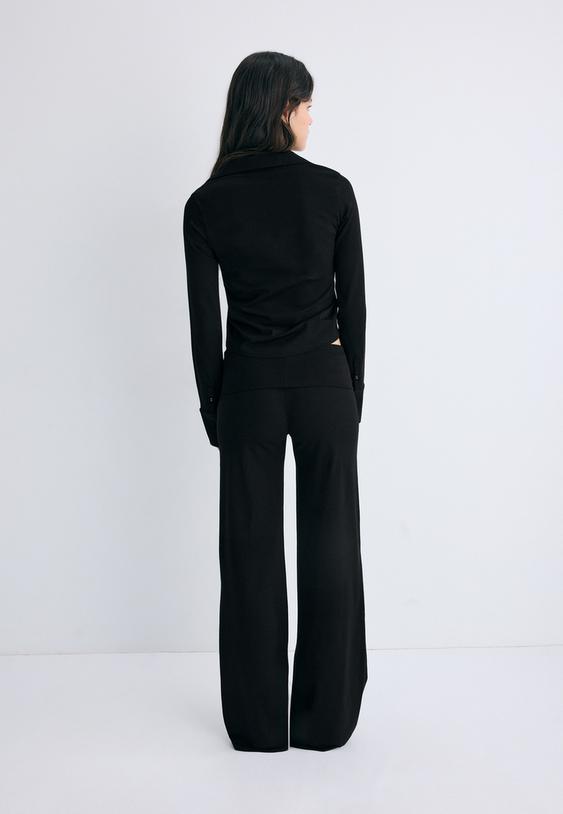 calcas de malha com cintura dobrada