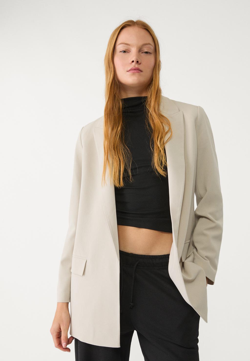 Soepelvallende open blazer