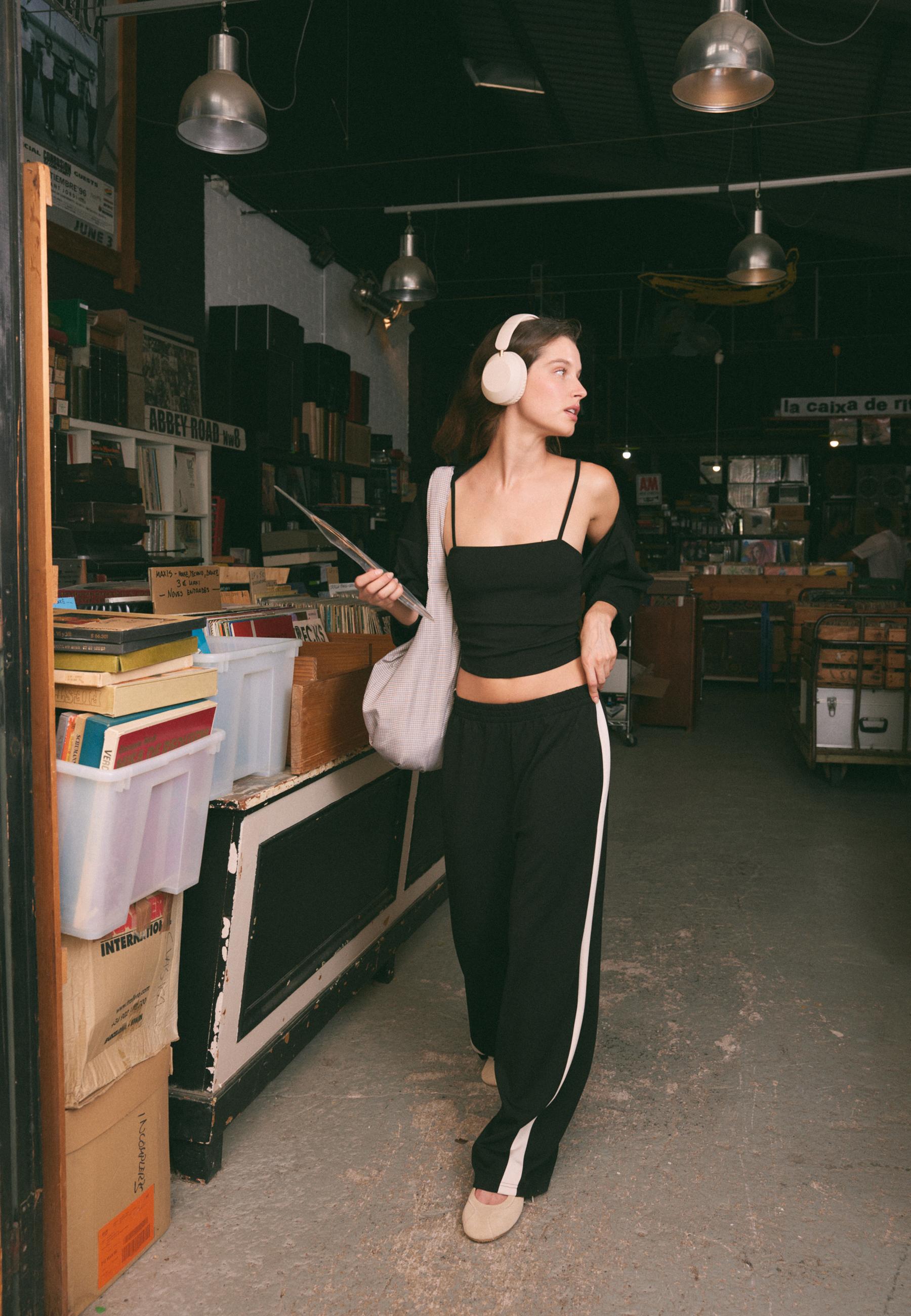 Soft-touch wide-leg jogger trousers with side band — Black