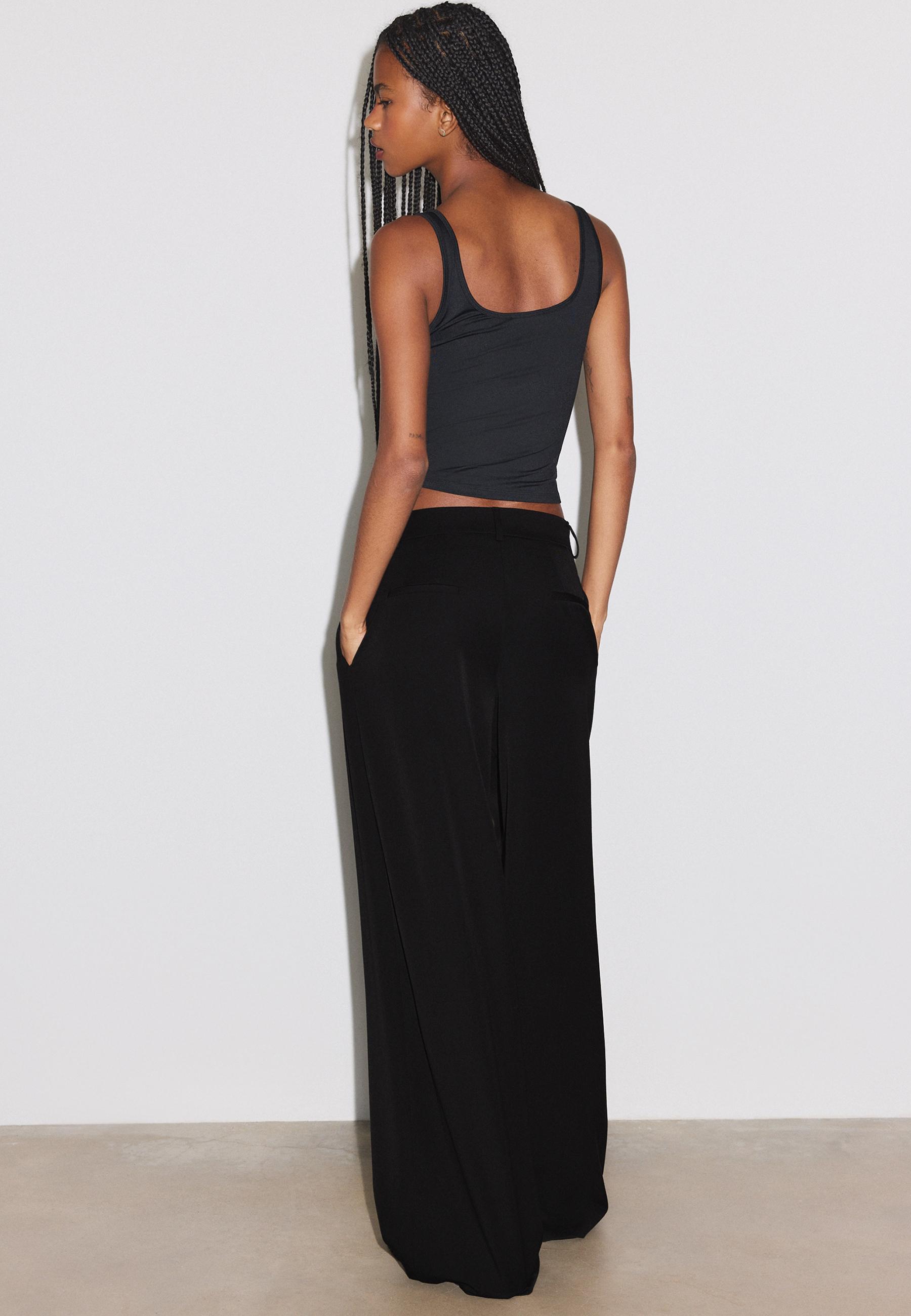Wide-leg tailored trousers with darts — Black