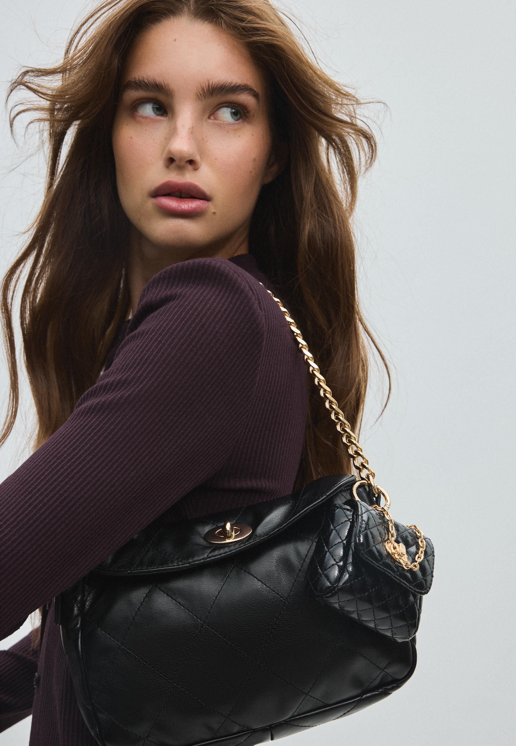 Quilted charm mini bag — Black