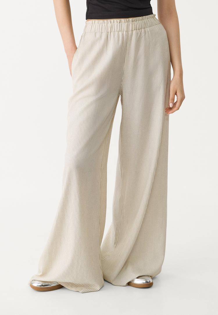 pantalon palazzo fluido con lino