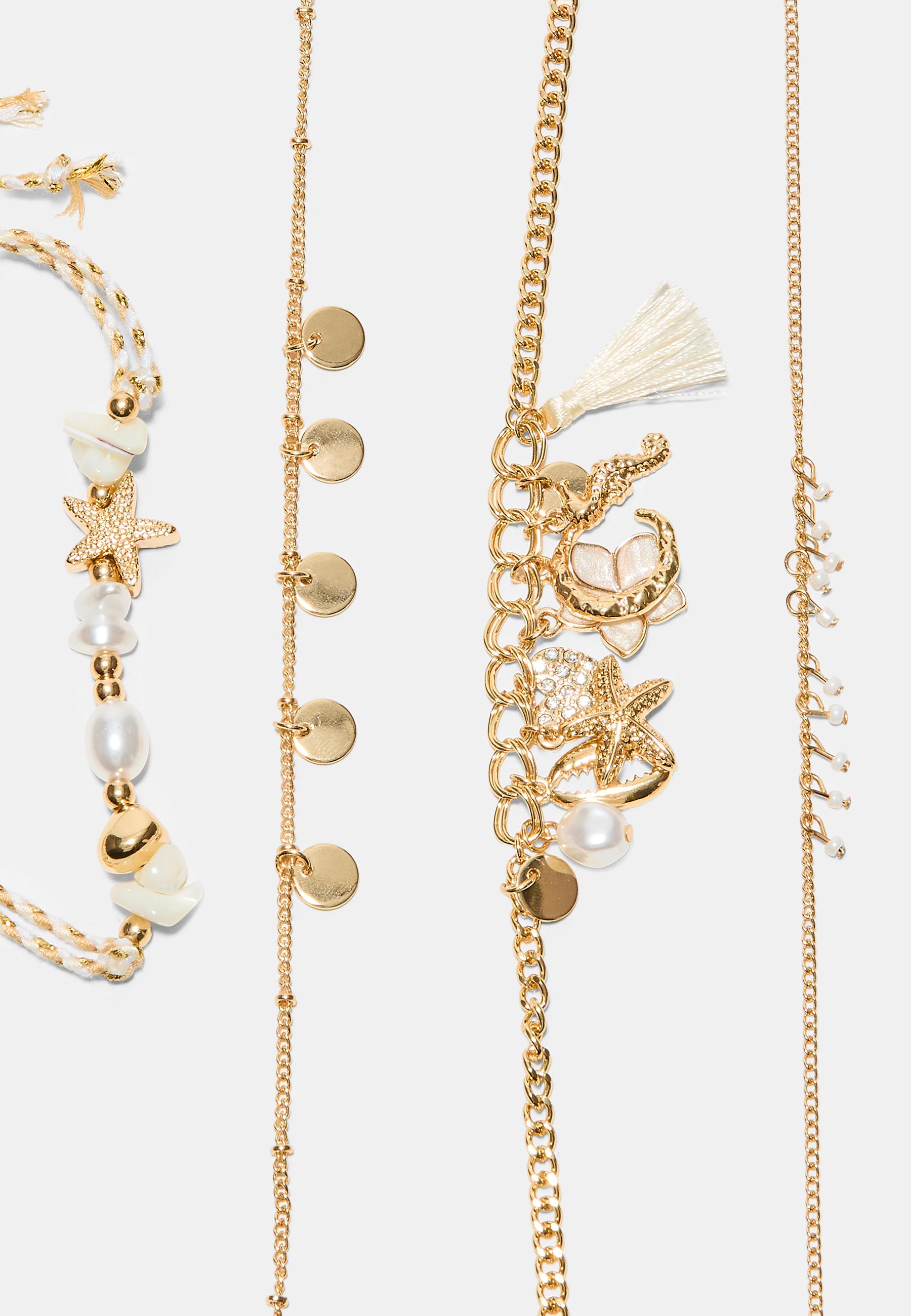 Set of 4 charm anklets — Gold