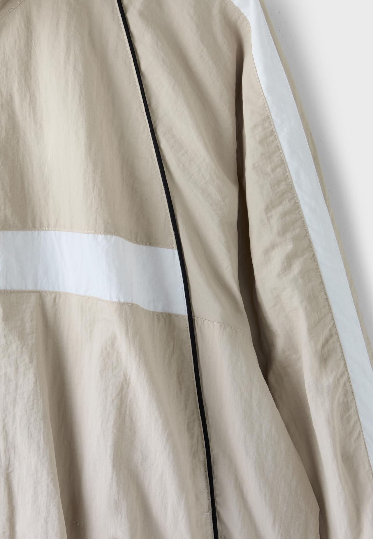 Technical windbreaker jacket — Stone