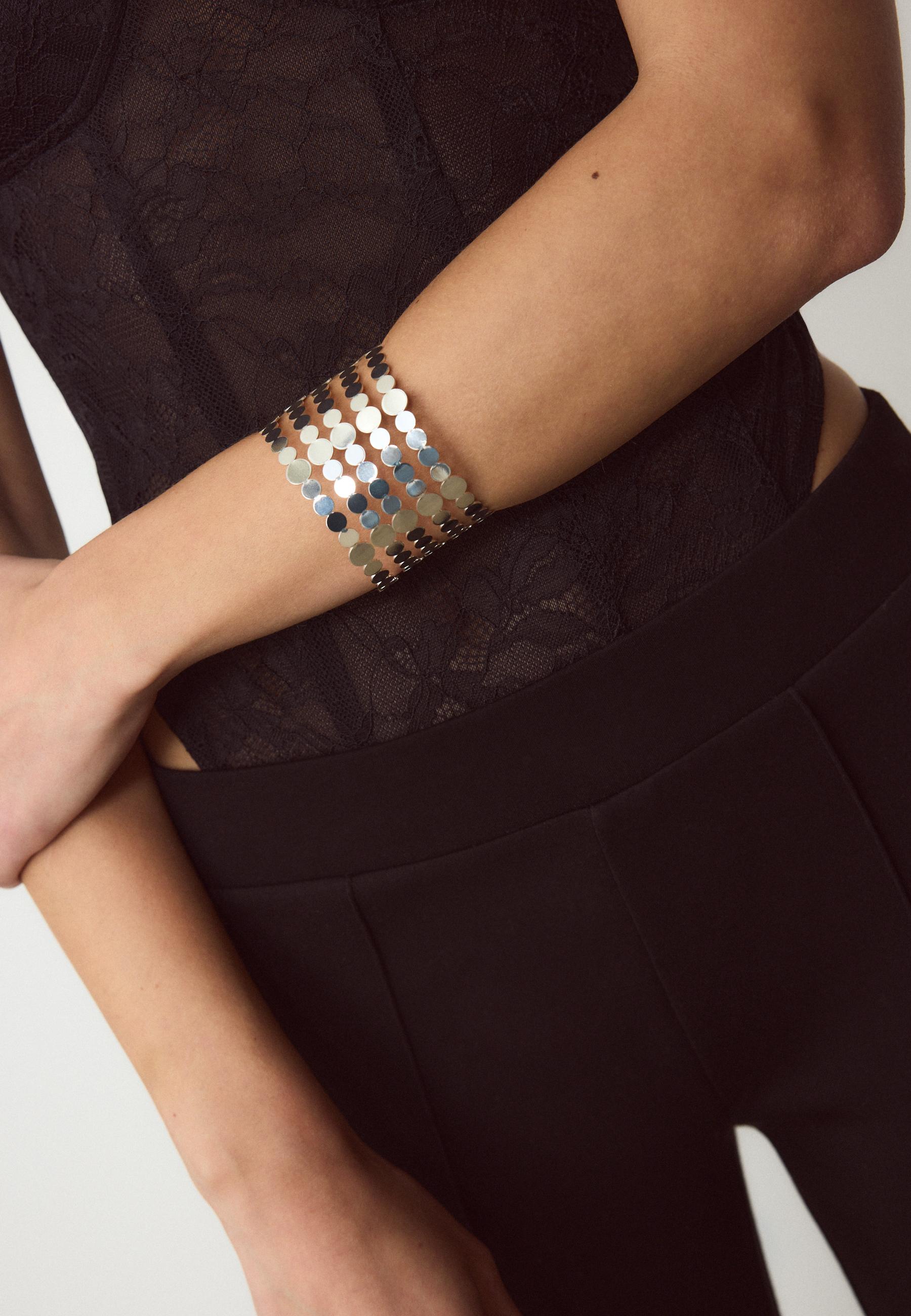 Rigid arm cuff — Grey