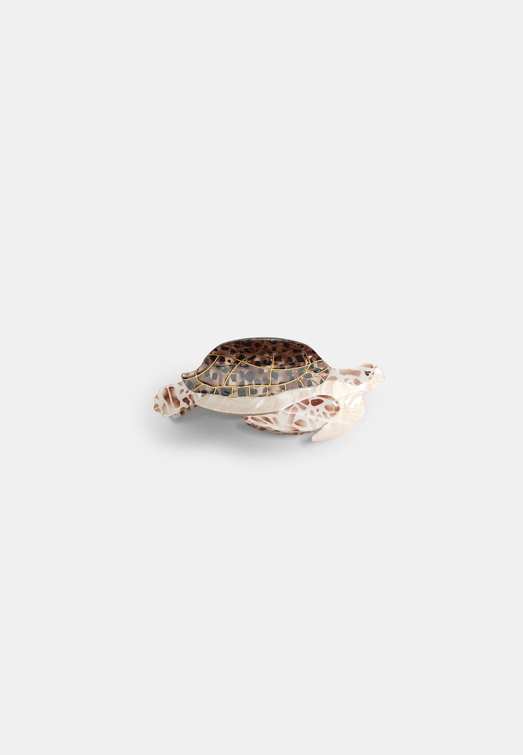 Pince à fourrure tortue