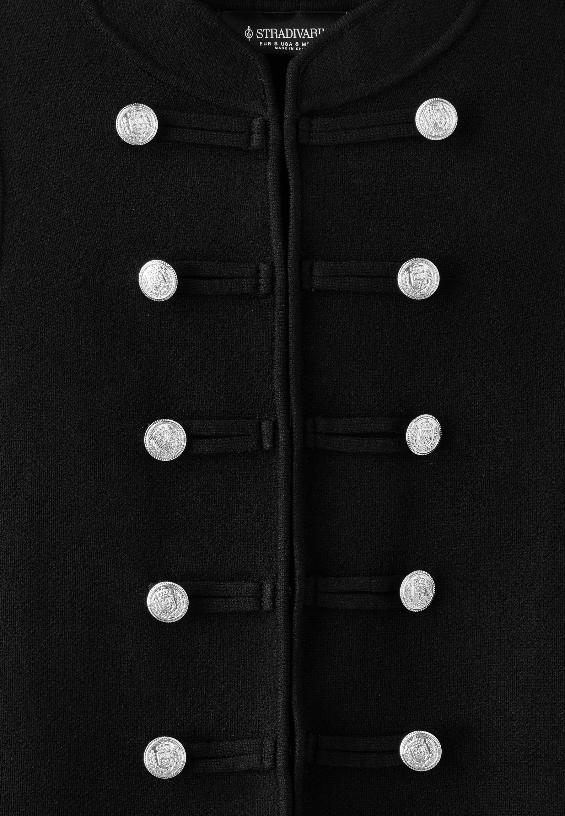 Buttoned knit vest — Black