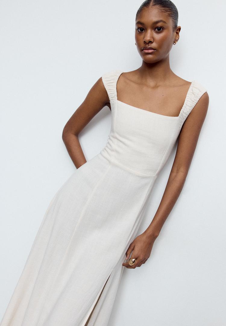 vestido fluido midi cruzado nas costas com linho