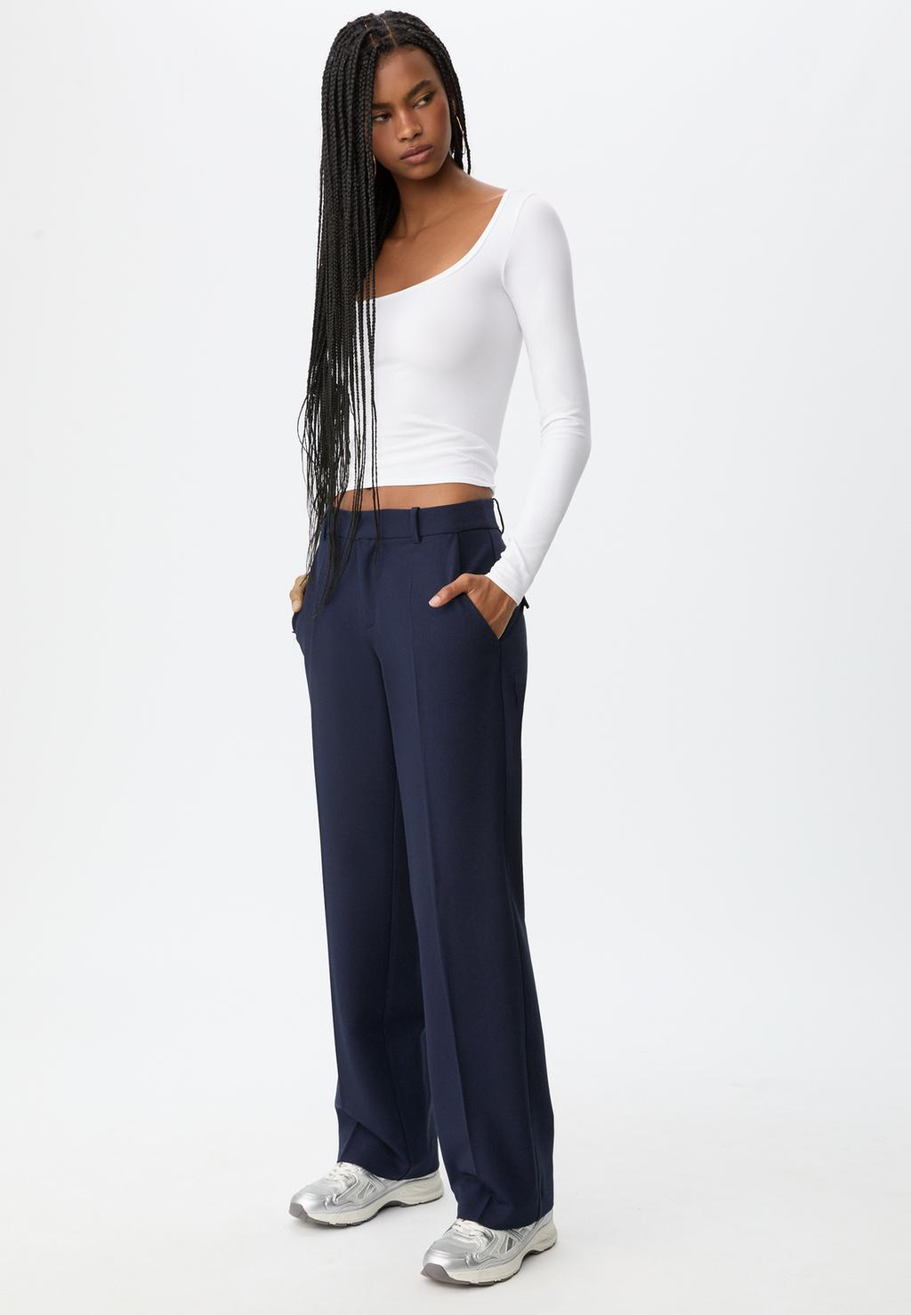 Pantalón vestir bolsillos