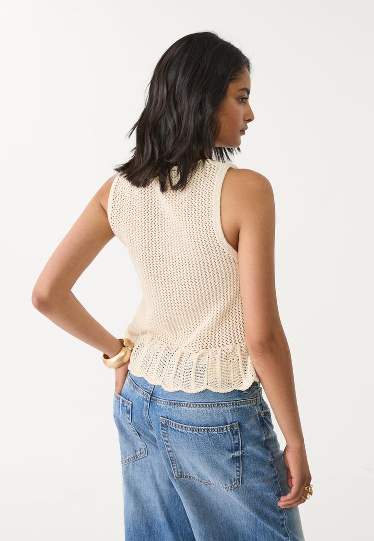 top in maglia traforata con bottoni
