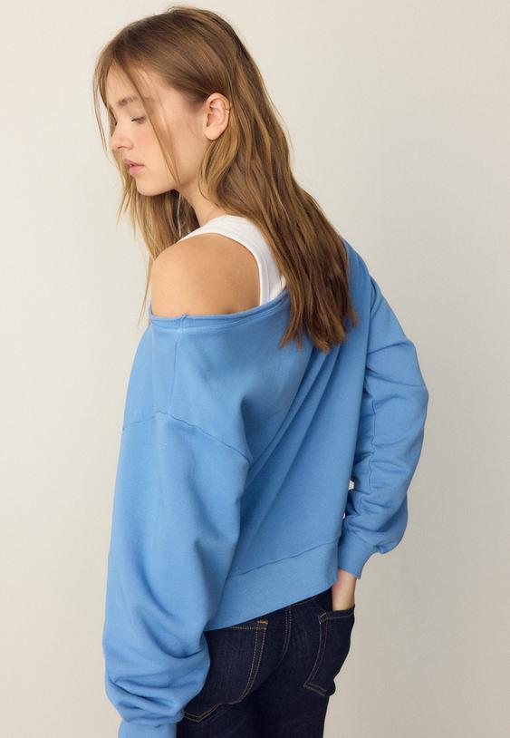 payetli kanatl kayk yaka sweatshirt