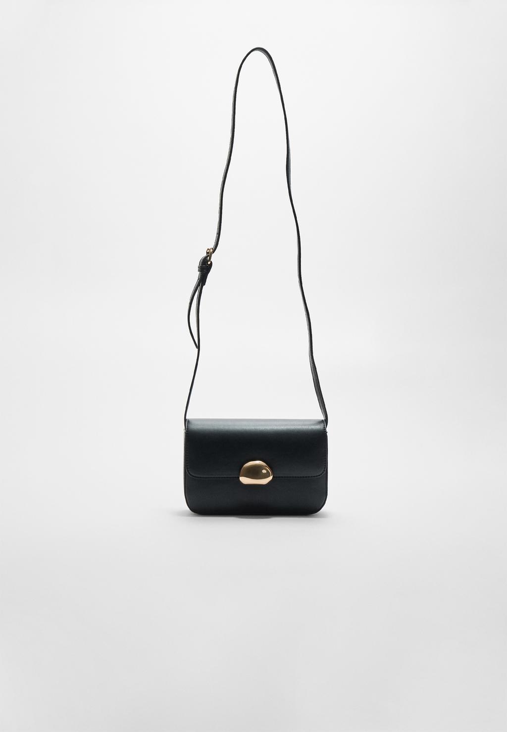 Crossbody bag with metal clasp