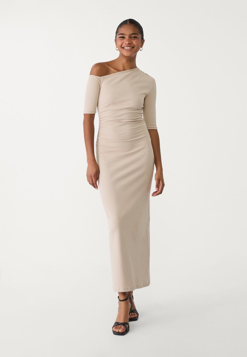 Long dress with an asymmetric neckline