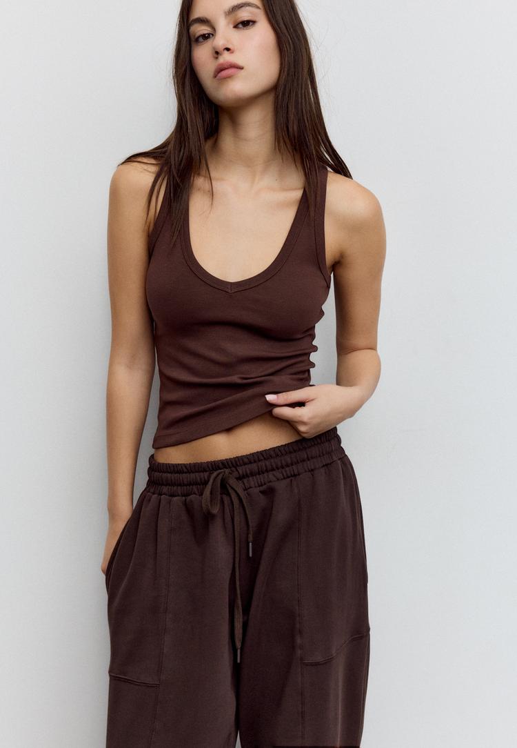 camiseta nadadora cuello pico