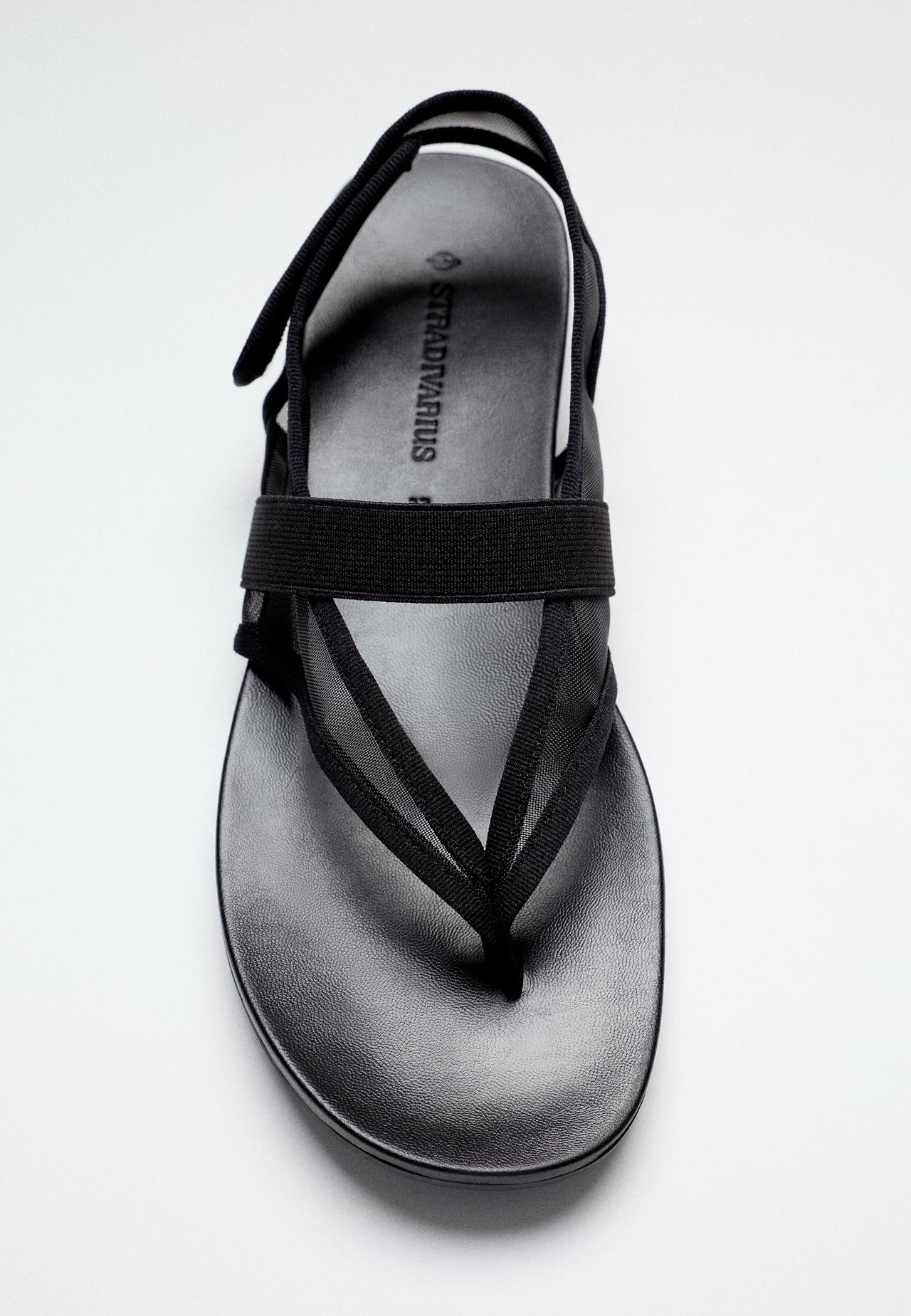 Flat thong mesh sandals — BLACK