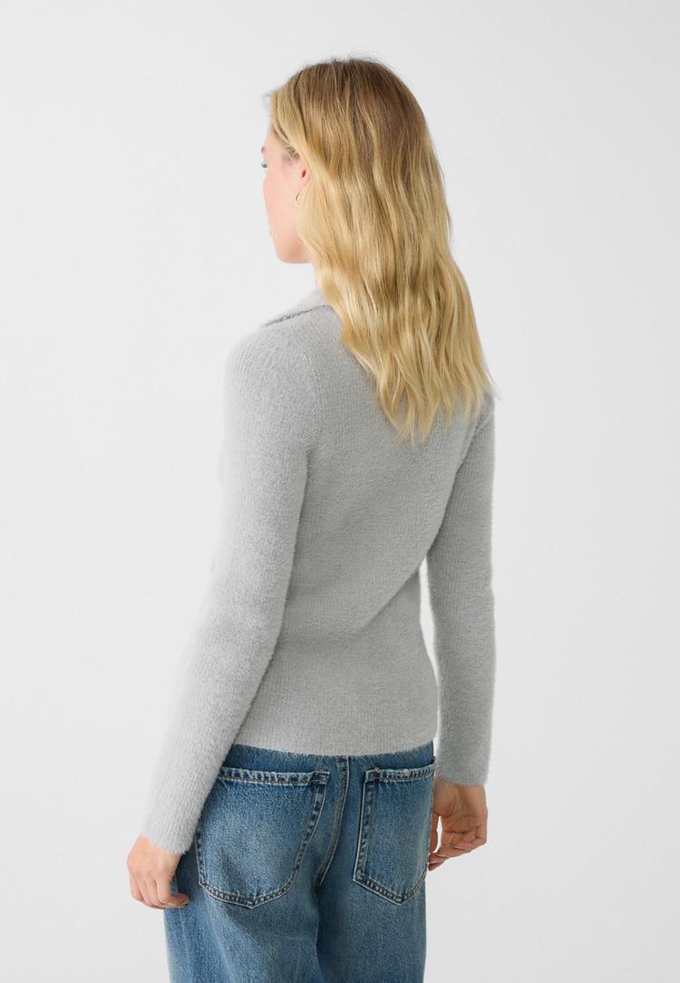 veste avec boutons en fausse fourrure