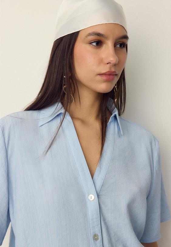 camisa fluida botones