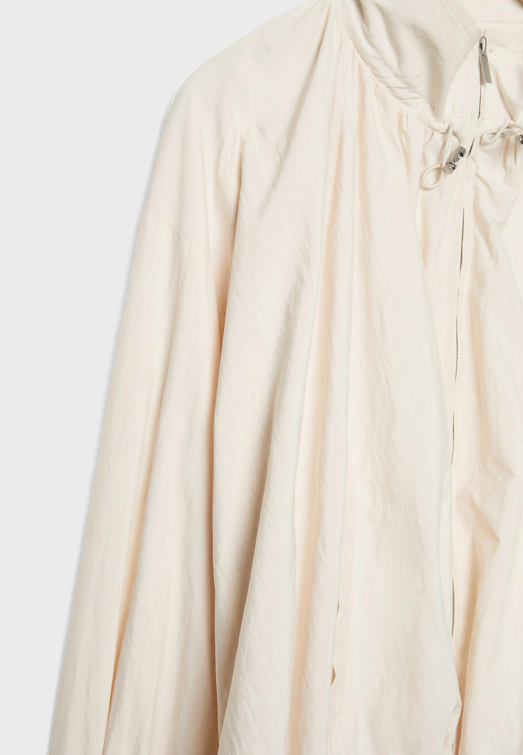 Technical high neck jacket — Ecru