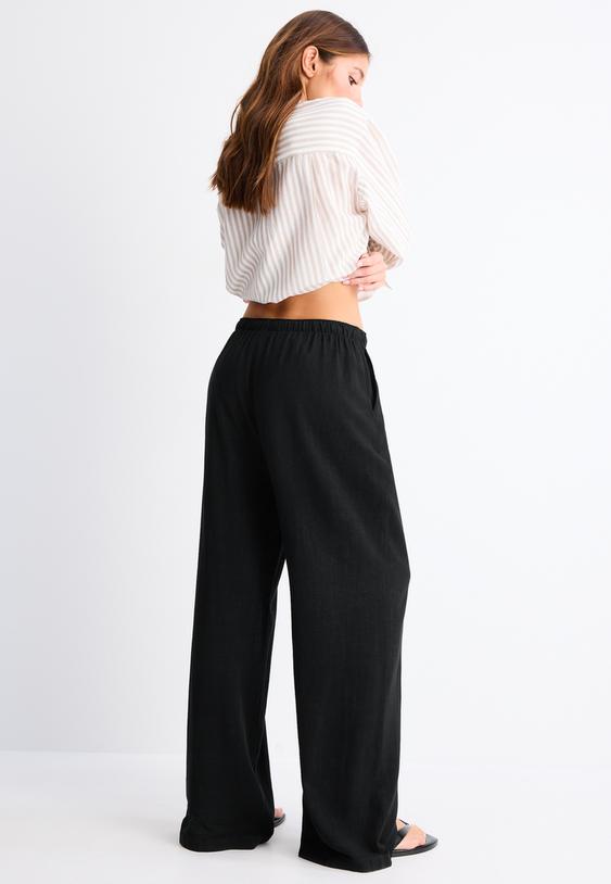 pantaloni fluidi effetto lino