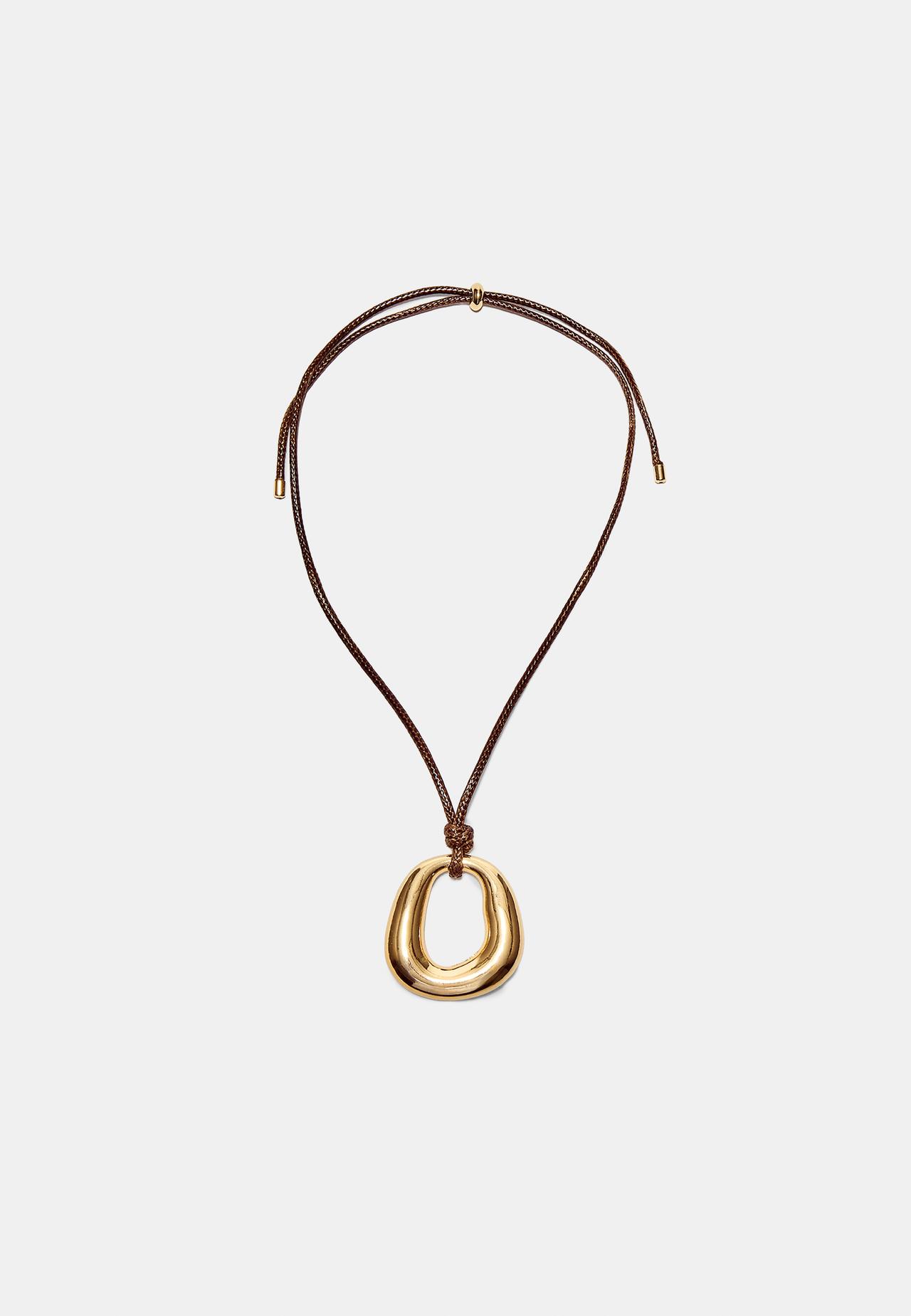 Cord necklace with charm — Gold