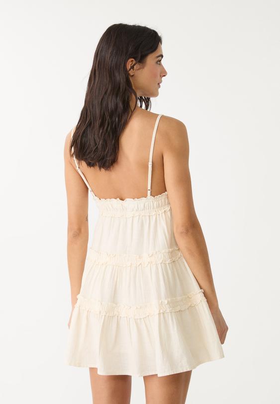 abito corto con spalline e volant