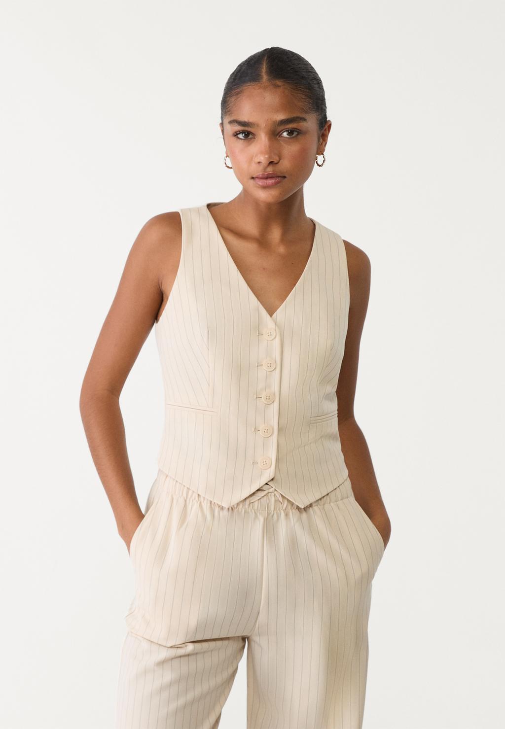 Short striped waistcoat with buttons