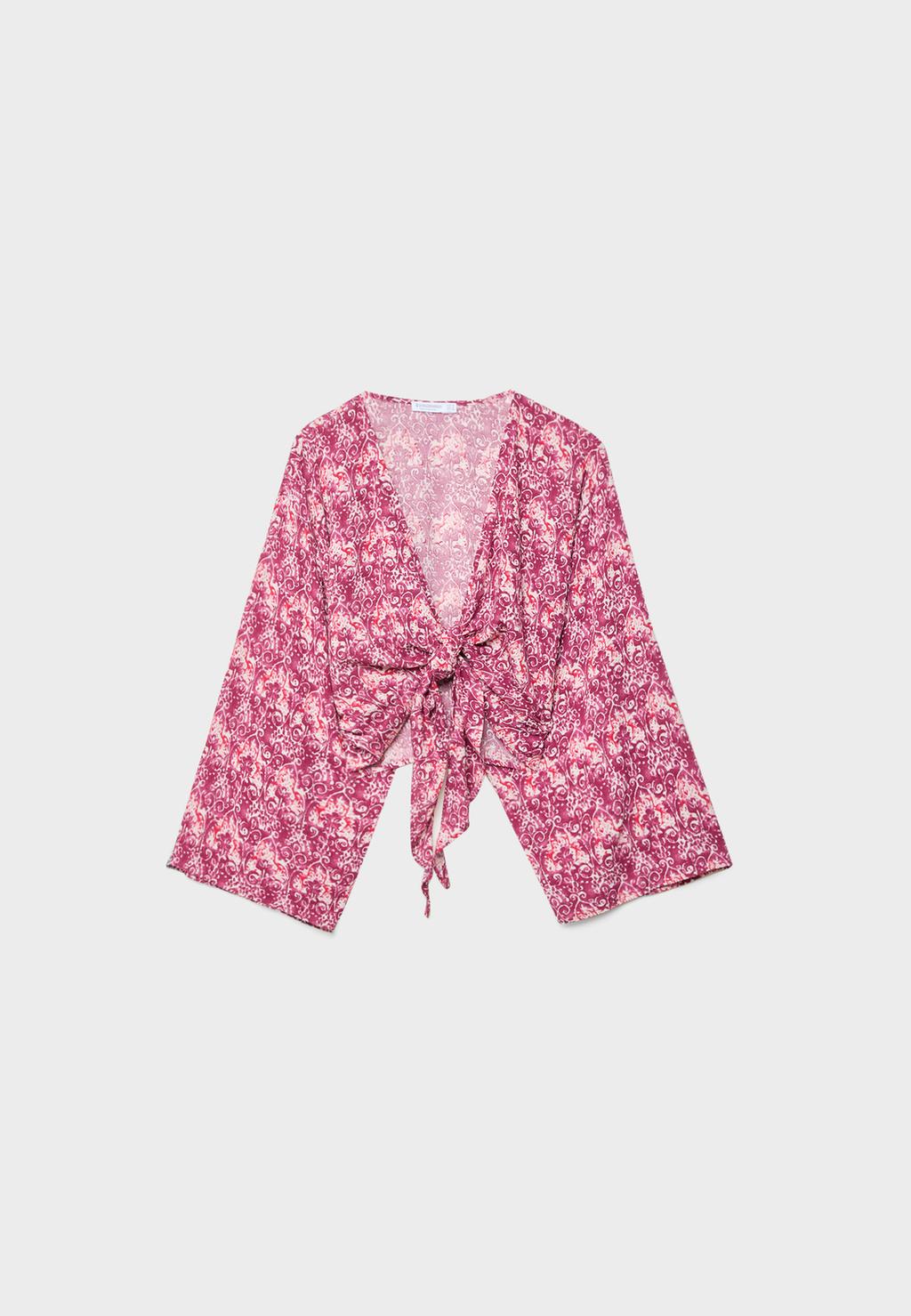 Blusa fluida nudo