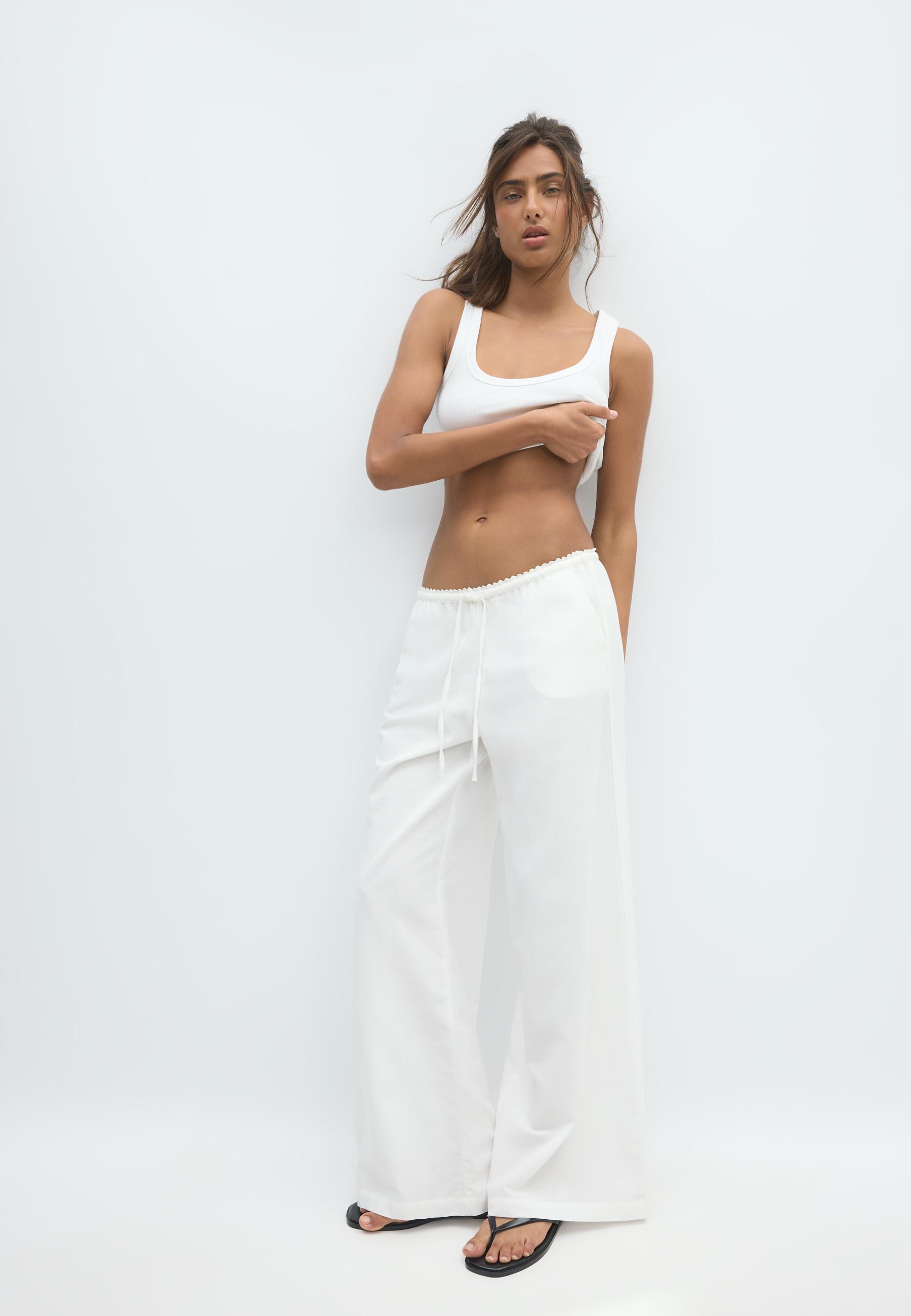 Wide-leg linen-effect trousers — Ecru