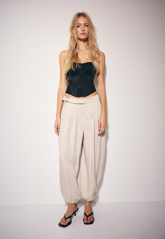 calcas estilo bombachas com fivela