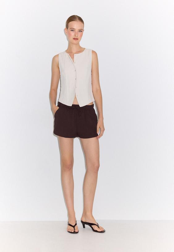 gilet regular con bottoni