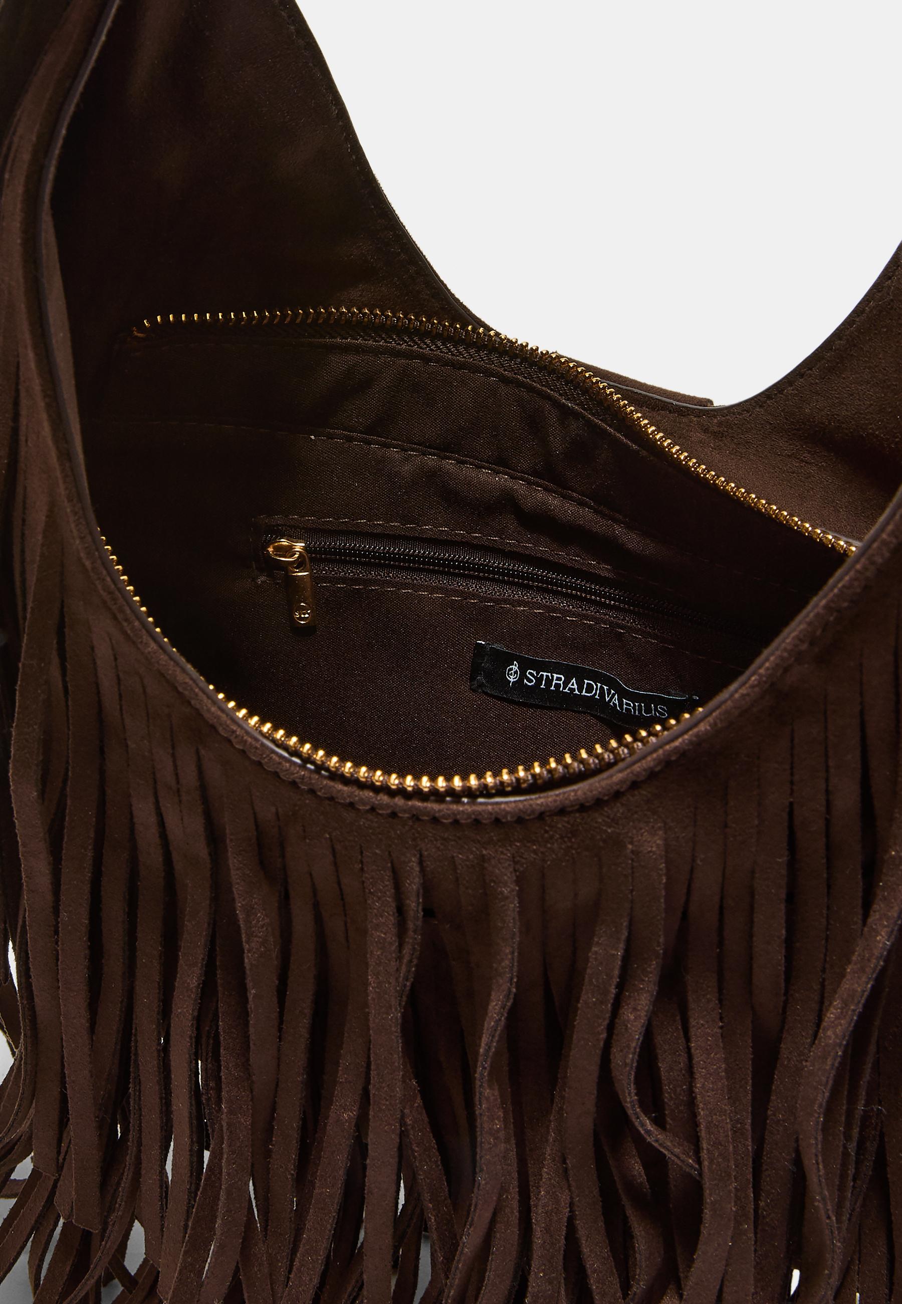 Shoulder bag with fringe and buckle detail — Brown