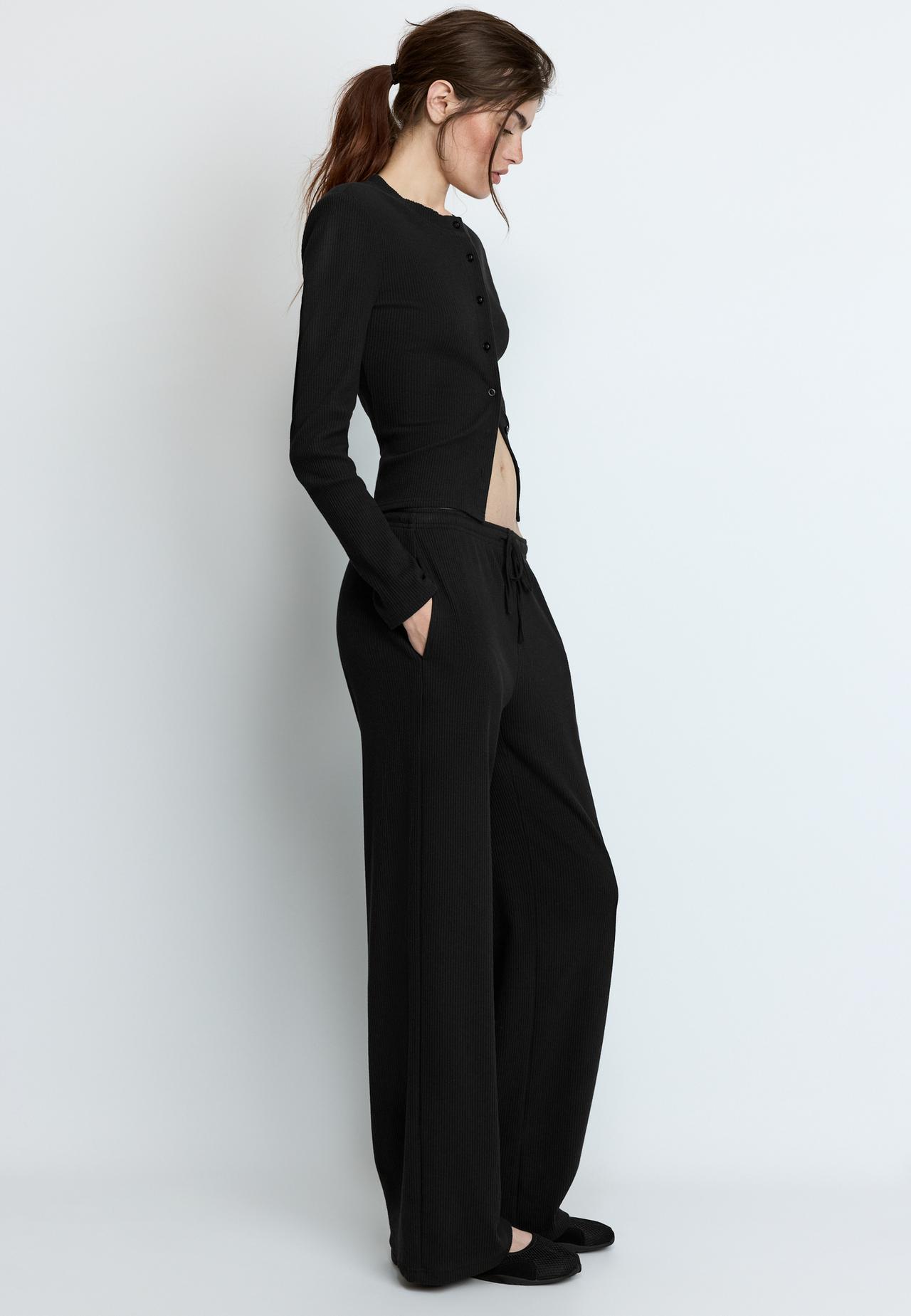 Soft-touch ribbed trousers — Black