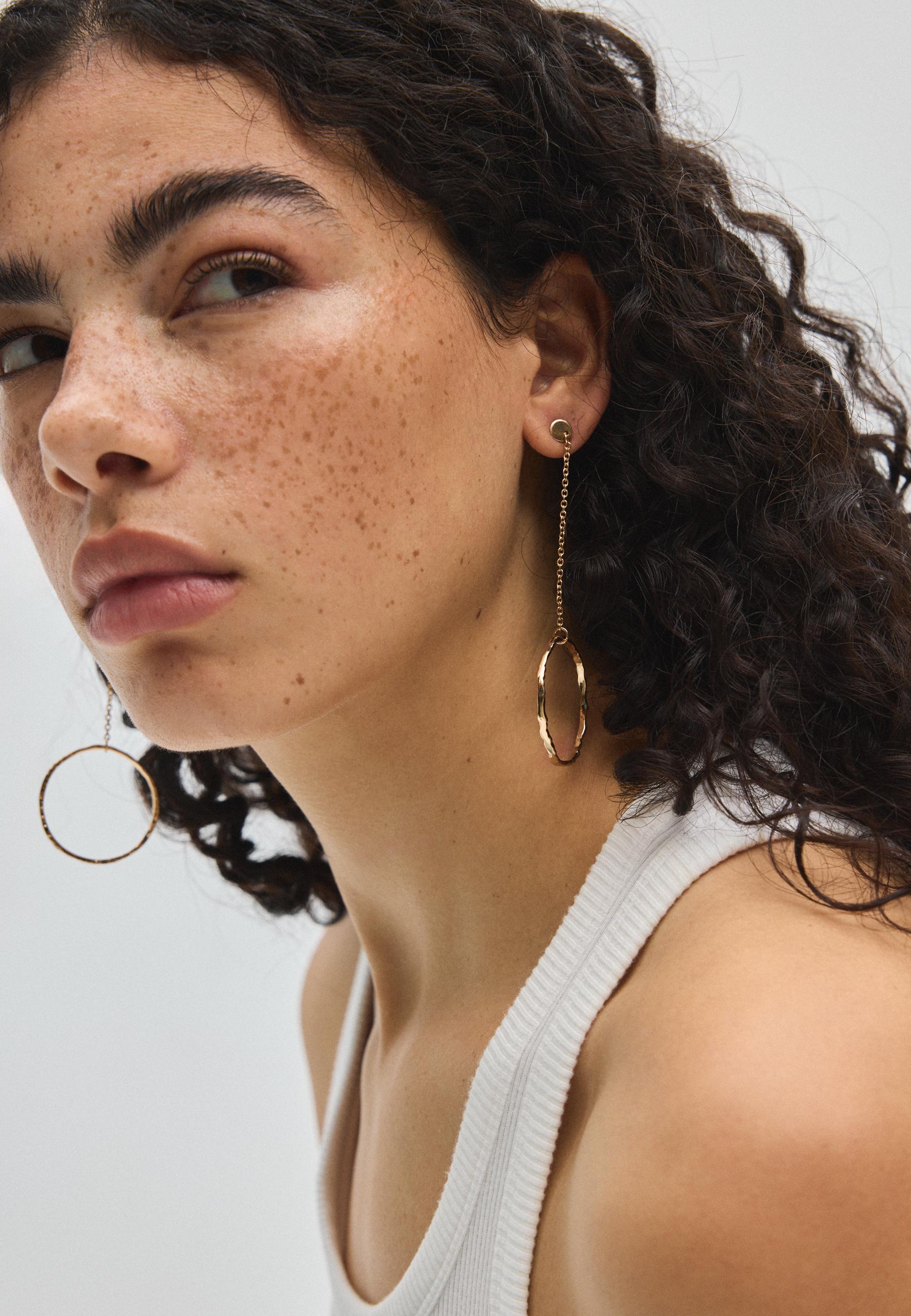 Long circle dangle earrings — Gold