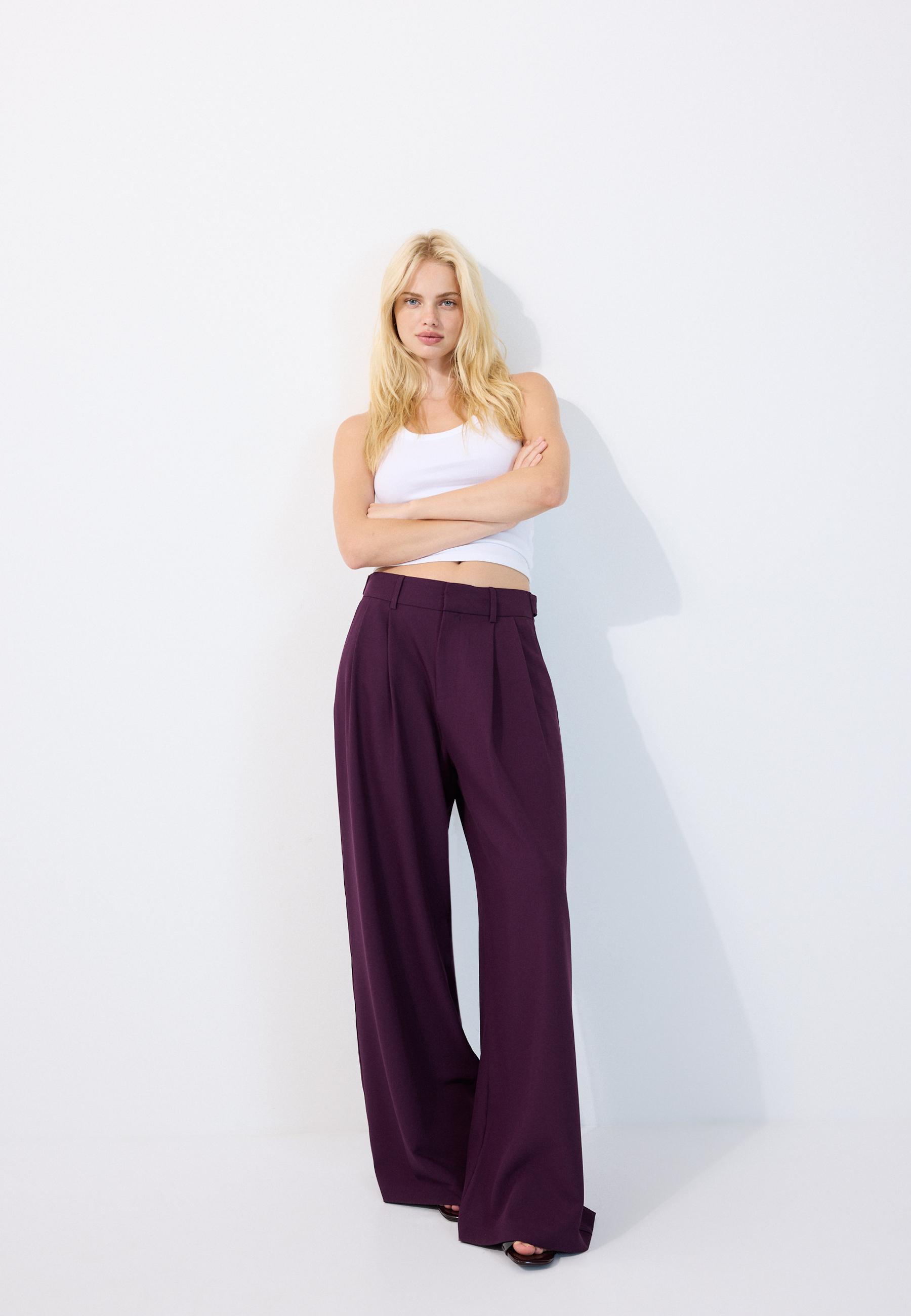 Pantaloni wide leg con bottoni regolabili