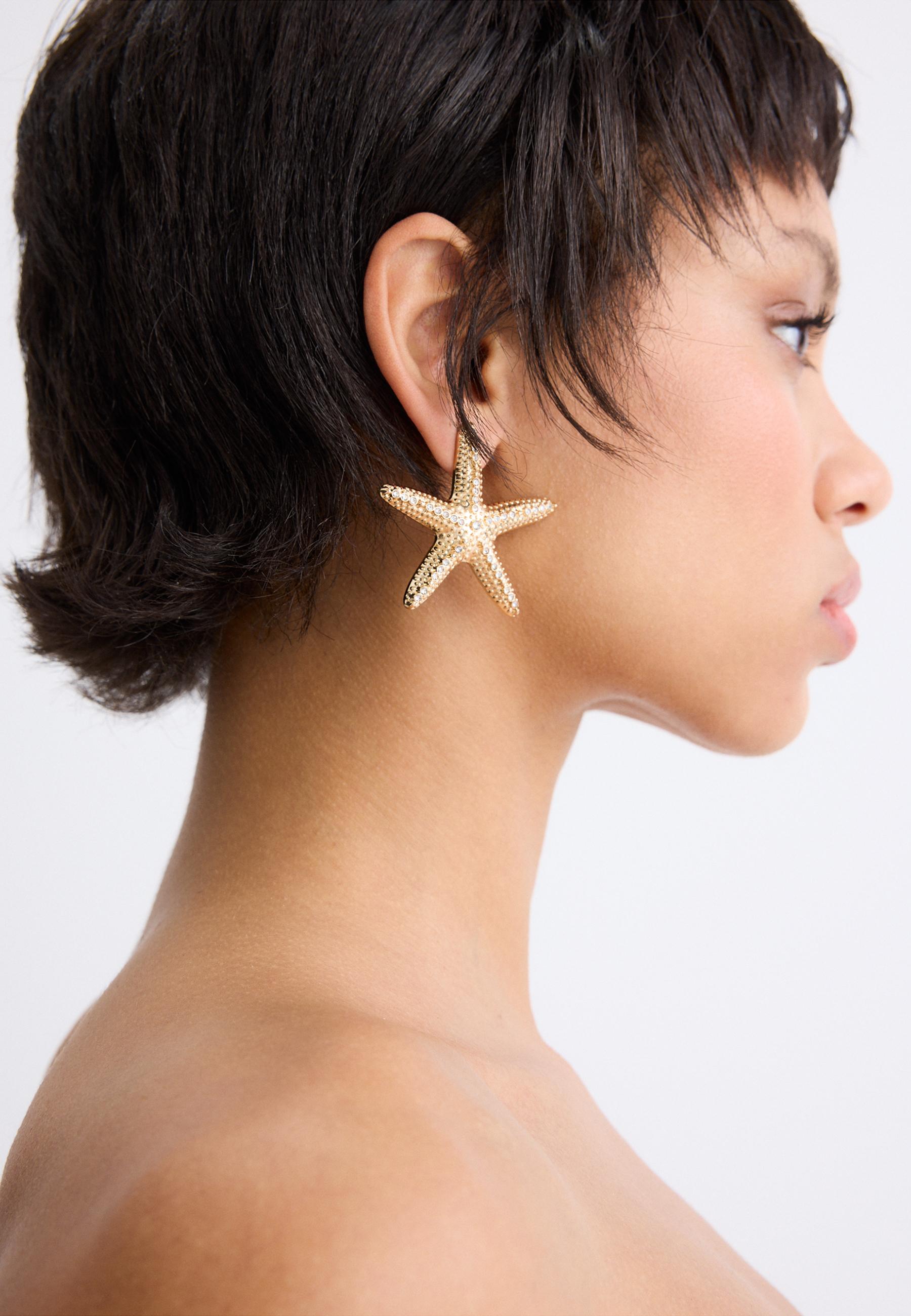 Starfish earrings — Gold