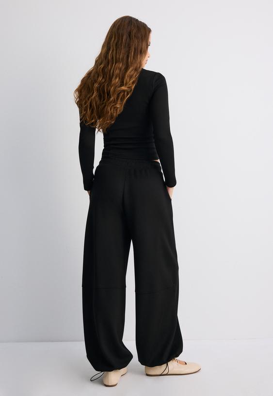 calcas jogger barrel de toque suave com stoppers