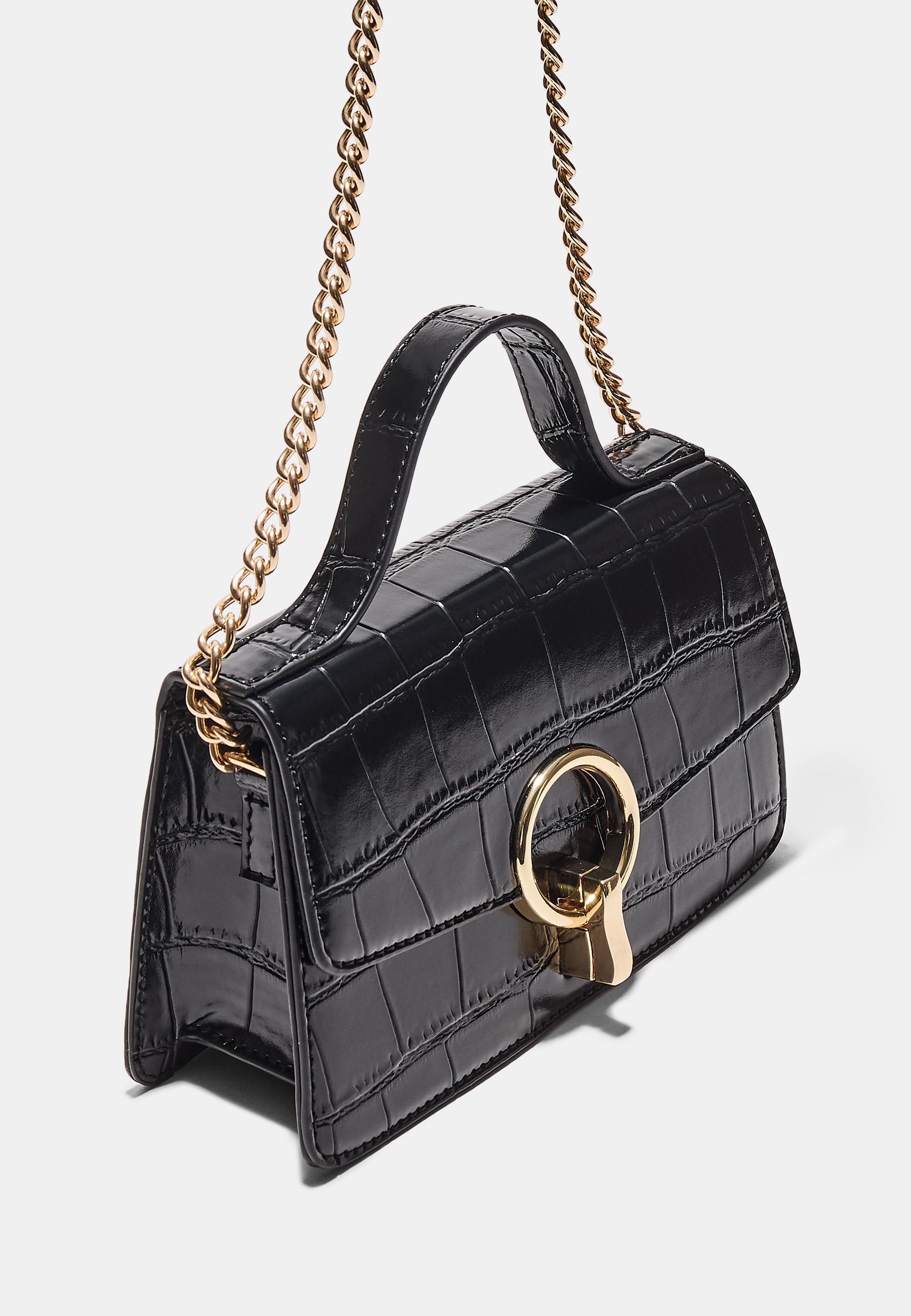 Timsah deseni görünümlü yuvarlak kapamalı çapraz askılı çanta