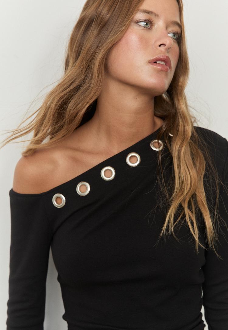 vestito corto asimmetrico con occhielli