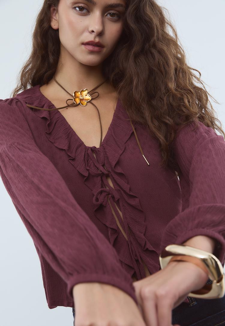 blusa fluida volantes