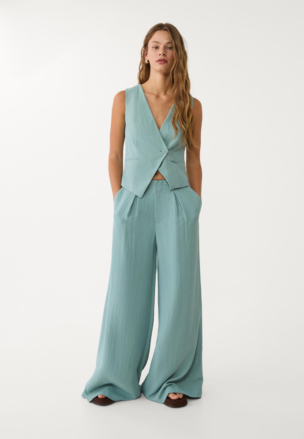 Flowing textured trousers with darts