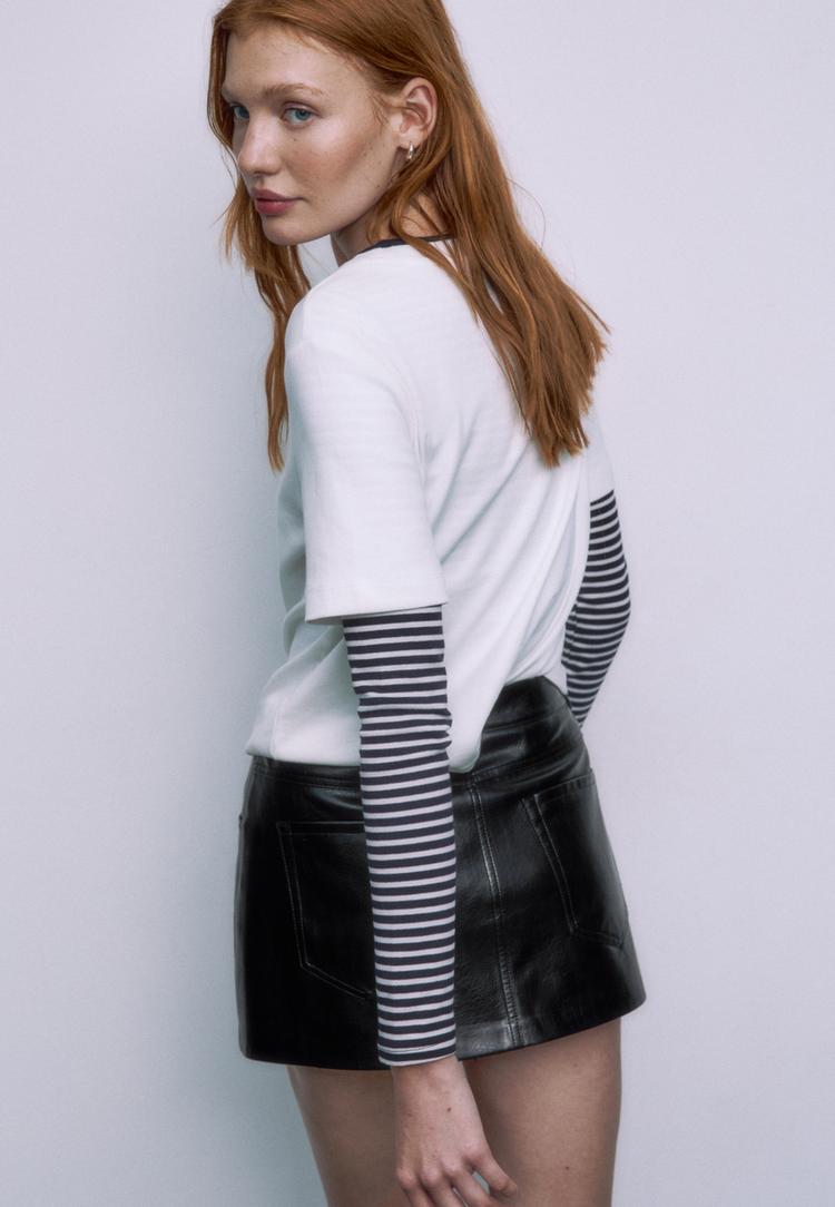 d62 falda pantalon mini efecto piel