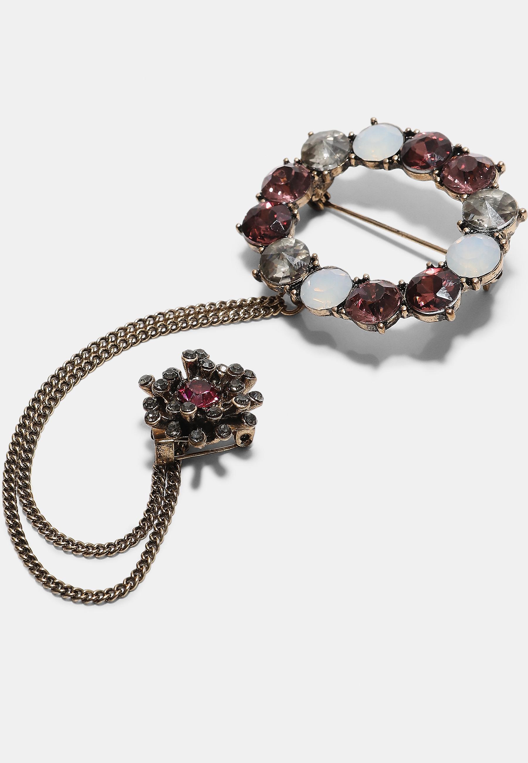 Jewelled chain brooch — Gold