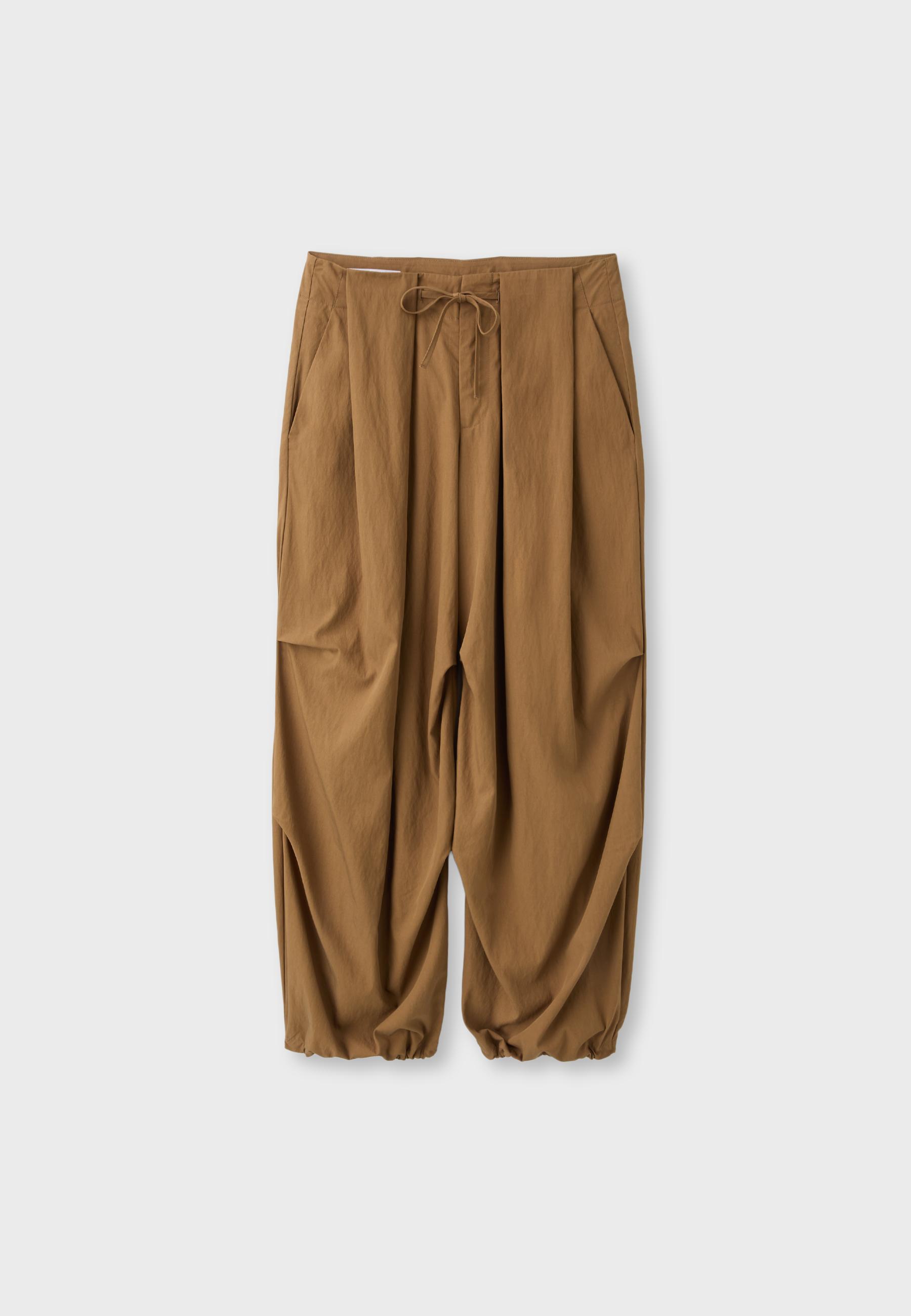 Technical pleated trousers — Dark camel