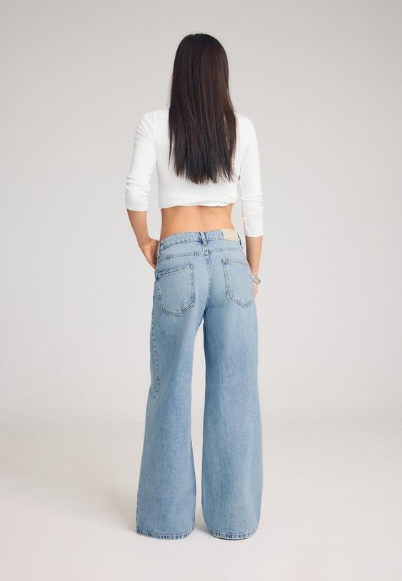 jeans de cintura cruzada
