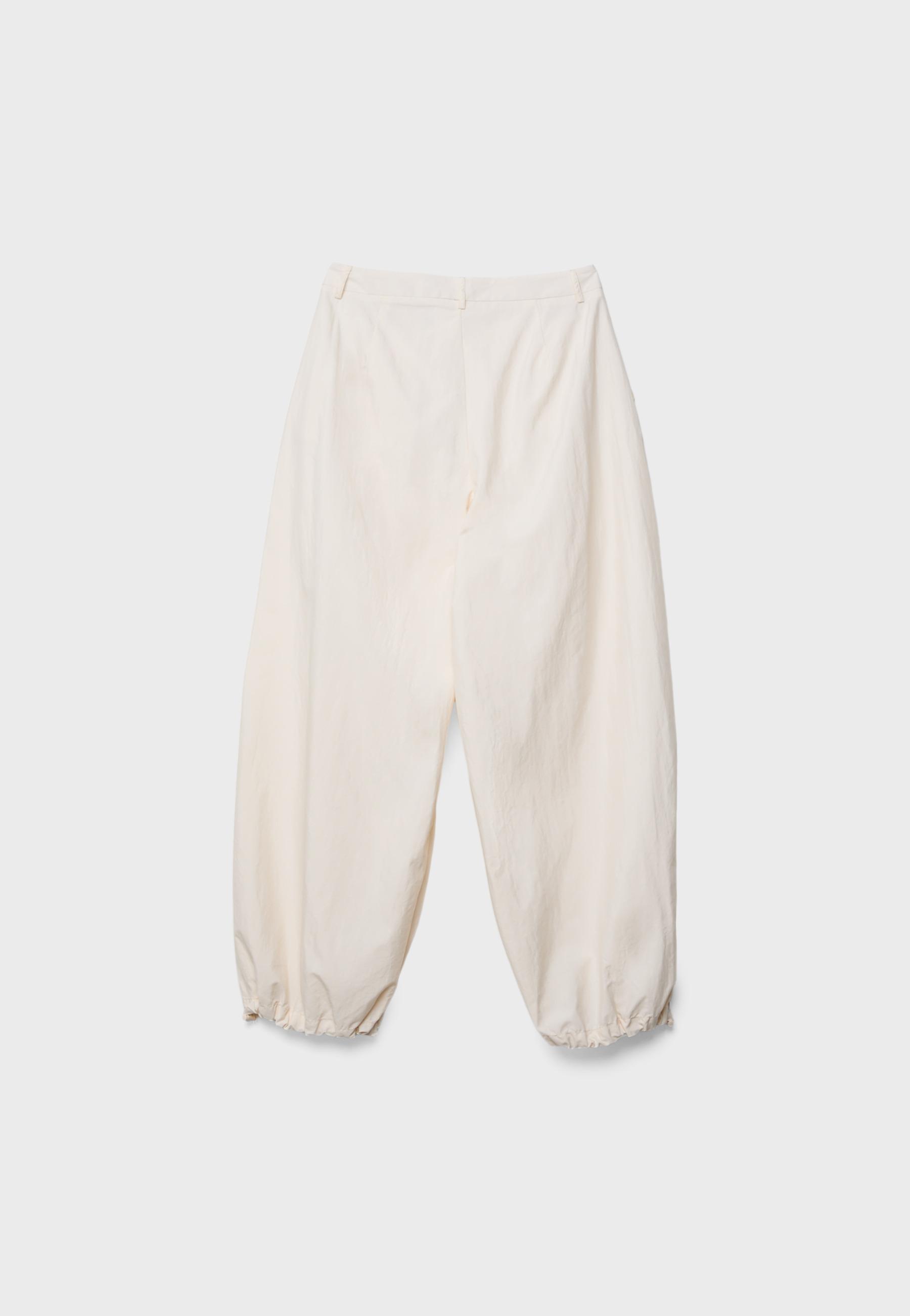 Darted technical sarouel trousers — Ecru