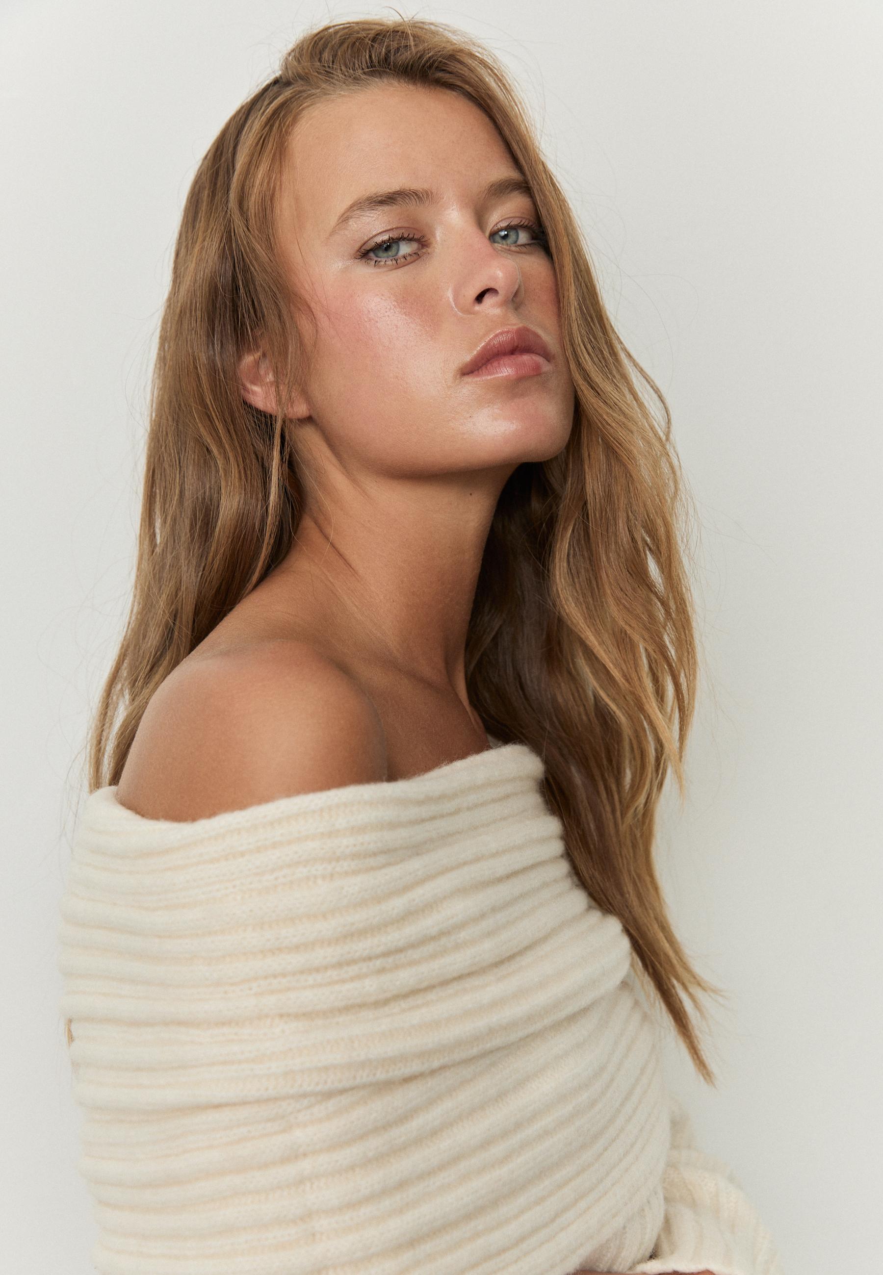 Asymmetric exposed shoulder knit sweater — Ecru