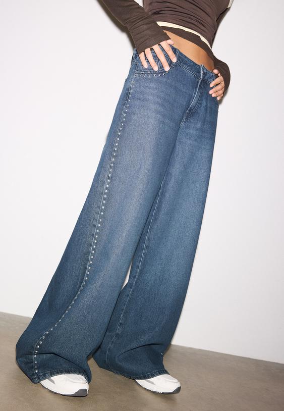 jeans wide leg tachas corazon