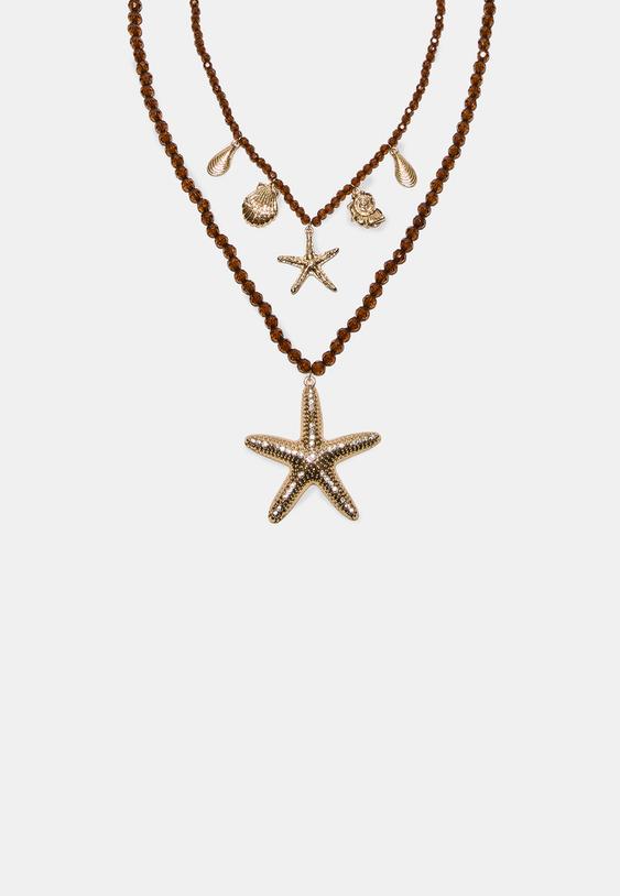 conjunto de 2 colares com missangas e estreladomar