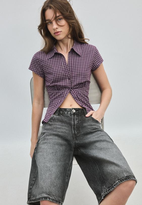 camicia a maniche corte con cucitura sotto il seno