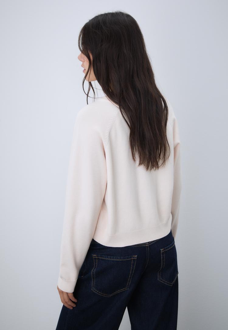 veste en maille boutonnee a manches raglan